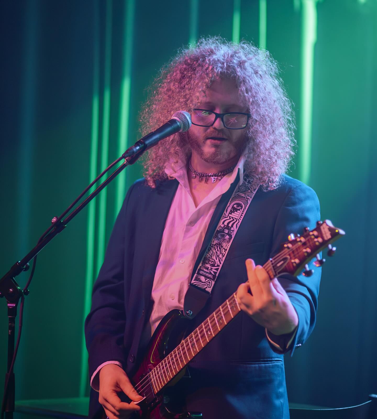 Jordan Clemens(Curlz) playing guitar and singing